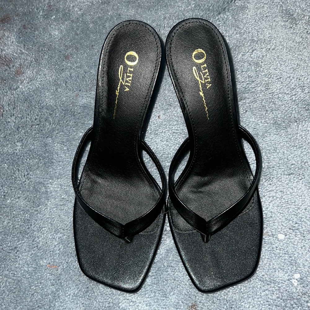 Black sandal heels.